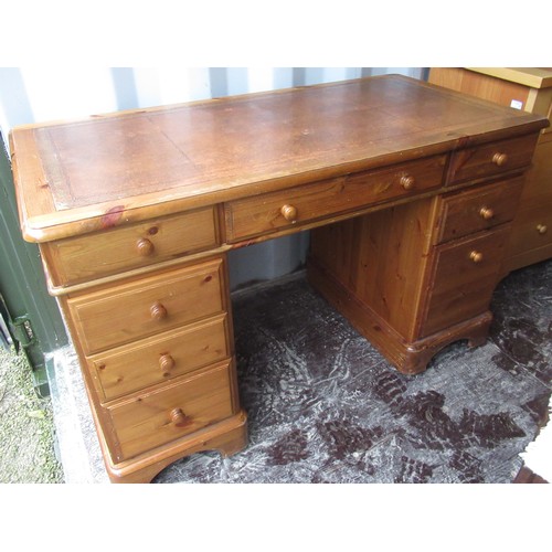 1053 - Modern pine kneehole writing desk, with inset top, three frieze and five pedestal drawers on bracket... 