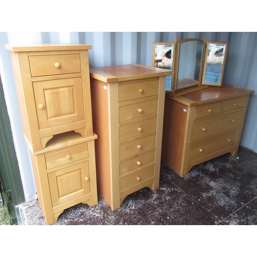 1054 - Suite of modern light wood bedroom furniture comprising of kneehole dressing table, chest of two sho... 