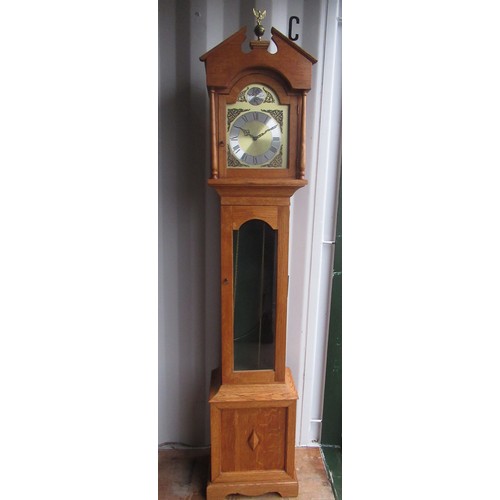 1207 - C20th light oak long cased clock, arched dial above glazed door on panel base with bracket feet, H20... 