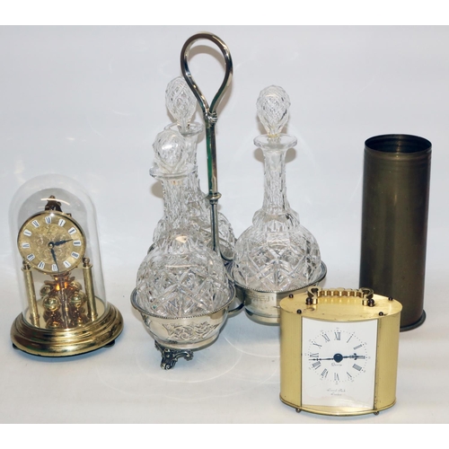 1280 - C20th set of three decanters on matching EPNS stand, WWI brass shell case, 400 day brass suspension ... 