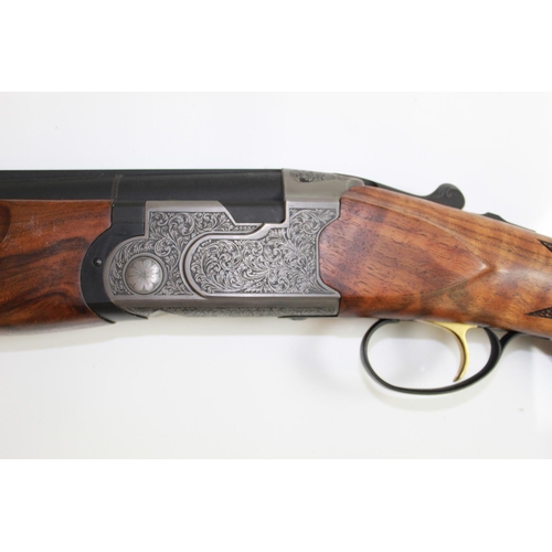 486 - Ataarms over/under double barrel multi choke shotgun ejector with single trigger and vented barrels.... 