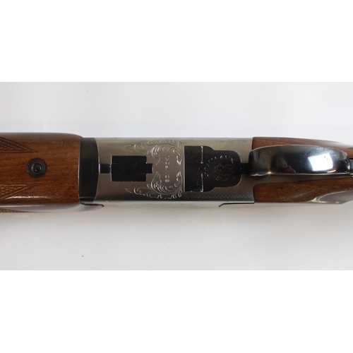 491 - Miroku 12Bore Over/under ejector shotgun. Barrel length28ins, length or pull 14ins. There is damage ... 