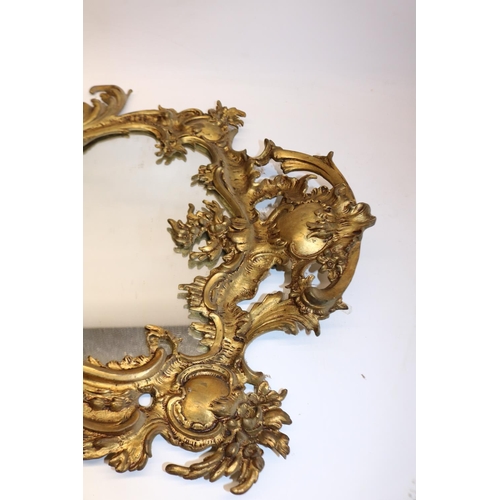 1209 - Chippendale style gilt painted cast metal framed wall mirror, with scroll and cartouche decoration, ... 