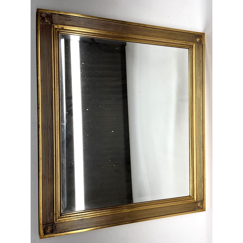 1045 - Regency style gilt wall mirror, bevel square plate in reeded frame with draught turned corners, 63cm... 