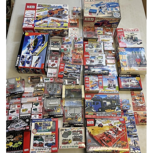 1290 - Collection of Takara Tomy Japanese import vehicle playsets, boxed vehicles, etc. (qty)