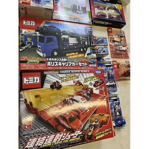 1290 - Collection of Takara Tomy Japanese import vehicle playsets, boxed vehicles, etc. (qty)