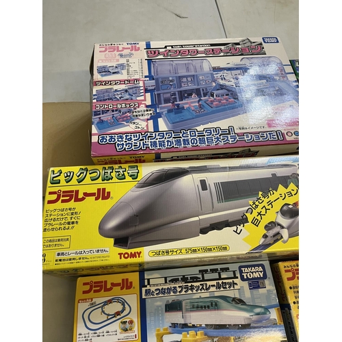 1291 - Collection of Takara Tomy Japanese import playsets incl. bullet train, monorail, train stations, etc... 