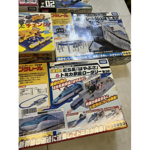 1291 - Collection of Takara Tomy Japanese import playsets incl. bullet train, monorail, train stations, etc... 