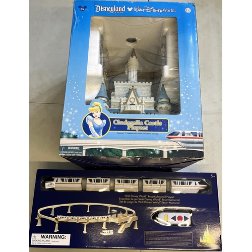 1297 - Disneyland Resort Cinderella Castle Playset, and a Walt Disney World Resort Monorail Playset, both b... 