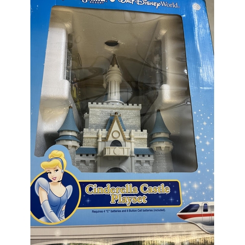 1297 - Disneyland Resort Cinderella Castle Playset, and a Walt Disney World Resort Monorail Playset, both b... 