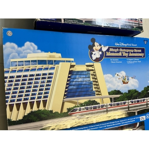 Walt Disney World Resort Monorail playset and two monorail toy accessories all boxed