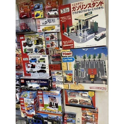 1290 - Collection of Takara Tomy Japanese import vehicle playsets, boxed vehicles, etc. (qty)