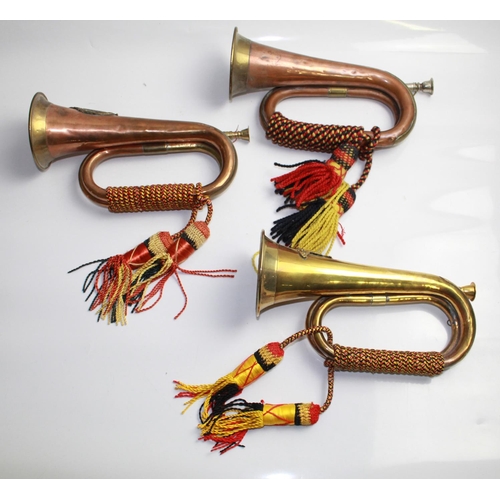 1355 - Three Military brass and copper bugles decorated with rope 'colours'. Sutherland and Argyll, Royal A... 