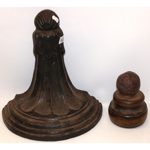 1032 - Large black painted cast iron door porter, H33.5cm, and another door stop (2)