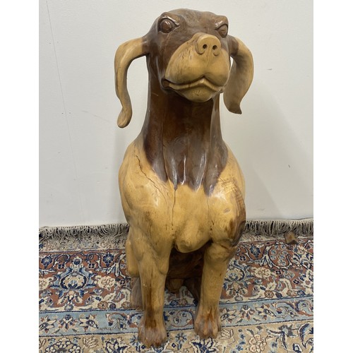 280 - Larged carved wood sculpture of a seated dog, H83cm