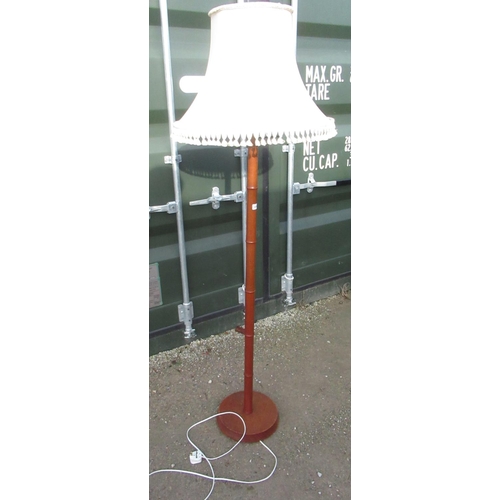 1059 - Teak floor lamp, bamboo turned column on circular base, with fringe shade