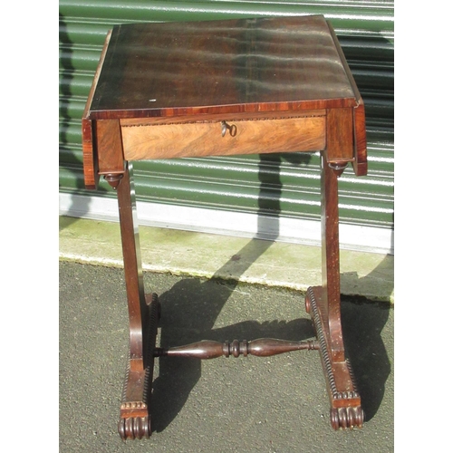 1213 - Regency rosewood sewing table, rectangular top with two fall leaves above a fitted frieze drawer on ... 