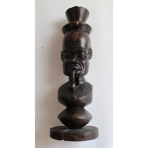 1359 - Two large tribal figures of husband and wife, pair of well carved ebony bookends and two single cand... 