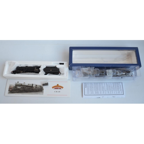 78 - Two OO gauge BR lined black electric steam train models from Bachmann to include 31-933 Midland Comp... 