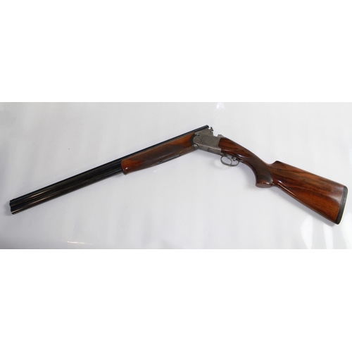 498 - Armi Silma Supreme 12bore O/U Shotgun. Single trigger ejector with 28ins vented barrels, length of p... 