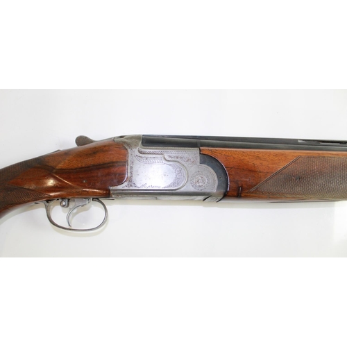 498 - Armi Silma Supreme 12bore O/U Shotgun. Single trigger ejector with 28ins vented barrels, length of p... 