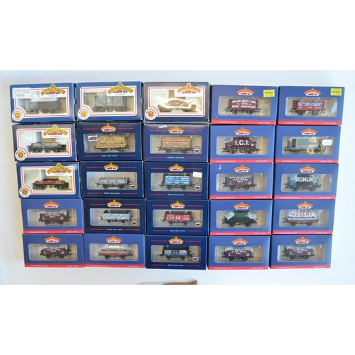 131 - Twenty five boxed OO gauge goods wagons by Bachmann. All contents appear as new/unused, box conditio... 