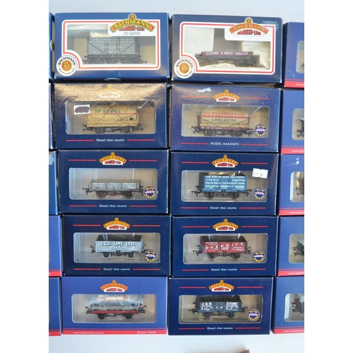 131 - Twenty five boxed OO gauge goods wagons by Bachmann. All contents appear as new/unused, box conditio... 