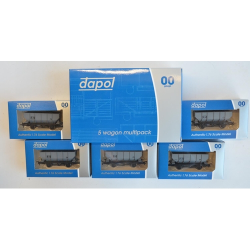 135 - Collection of OO gauge rolling stock from Dapol to include 3s 5 wagon multipacks (B500Multi Cattle W... 