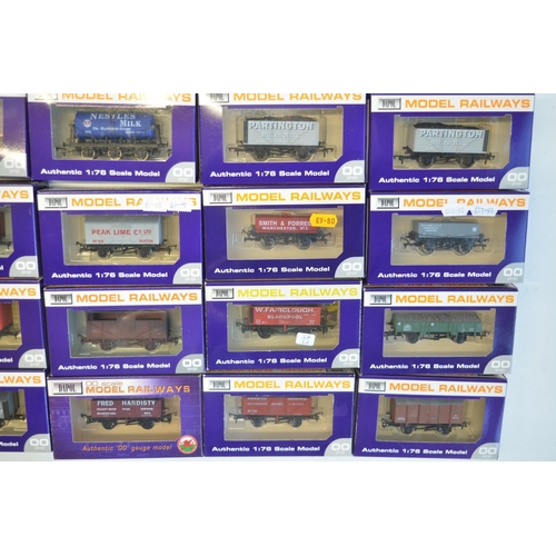 138 - Twenty boxed OO gauge goods wagons from Dapol to include weathered examples. All contents mint/unuse... 