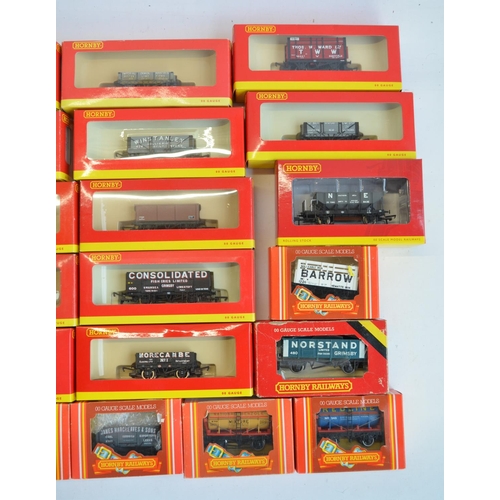 143 - Thirty one OO gauge goods wagon models from Hornby to include R6455 weathered BR green shark ballast... 