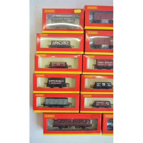 143 - Thirty one OO gauge goods wagon models from Hornby to include R6455 weathered BR green shark ballast... 