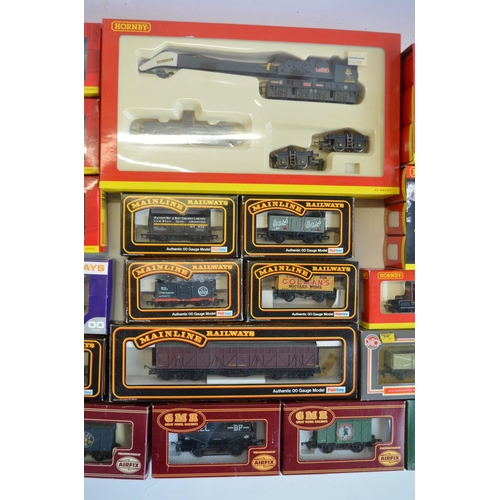 144 - Collection of OO gauge rolling stock models from Hornby, Dapol, Airfix and Mainline, box contents mo... 