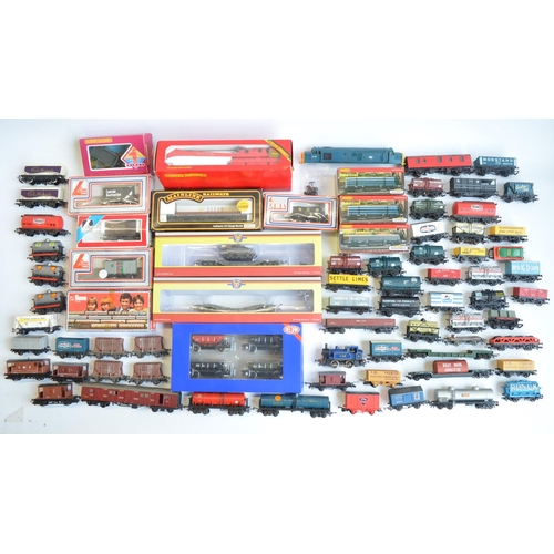 146 - Extensive collection of OO gauge rolling stock, boxed and unboxed, various manufacturers and conditi... 