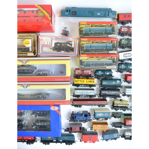 146 - Extensive collection of OO gauge rolling stock, boxed and unboxed, various manufacturers and conditi... 