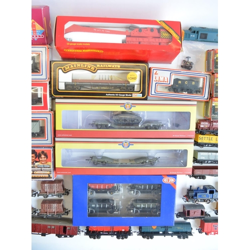 146 - Extensive collection of OO gauge rolling stock, boxed and unboxed, various manufacturers and conditi... 