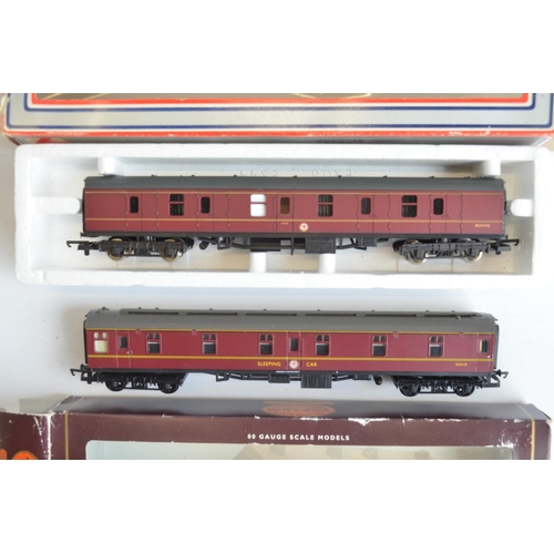 149 - Eight boxed OO gauge BR maroon passenger coaches from Hornby, Lima and Dapol to include sleeping and... 