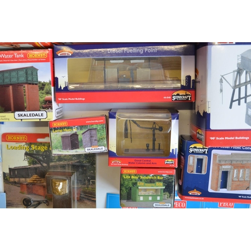 166 - Collection of OO gauge model railway scenic accessories, mostly station/railway maintenance related ... 