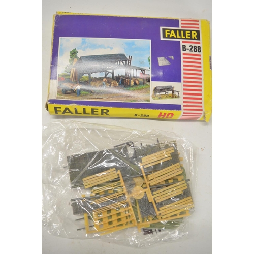 174 - Collection of OO and HO gauge model railway scenic and station related plastic model kits, various m... 