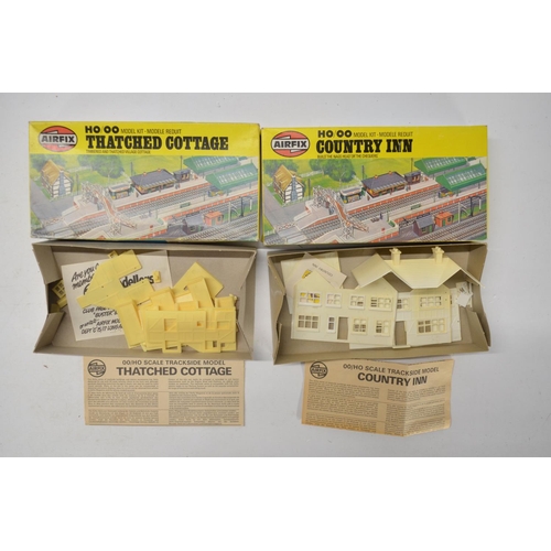 174 - Collection of OO and HO gauge model railway scenic and station related plastic model kits, various m... 