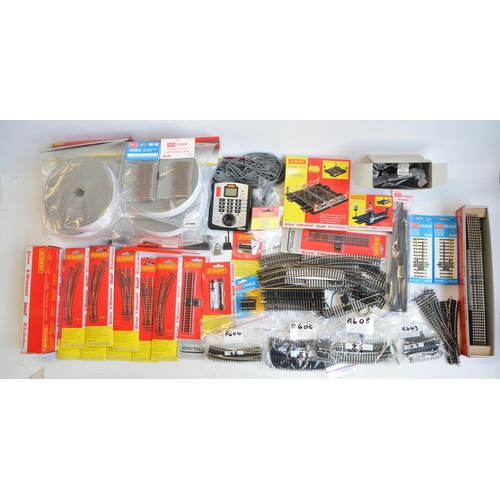 177 - Collection of OO/HO gauge track and track accessories to include Hornby points, R8243 surface mounte... 