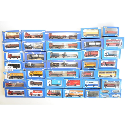 180 - Forty boxed 1/76 scale OO gauge diecast model vehicles from Base-Toys (B-T Models) to include trucks... 