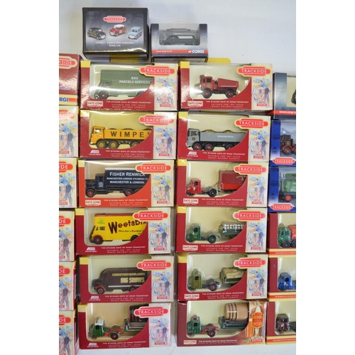 186 - Thirty two boxed 1/76 scale OO gauge diecast Trackside model vehicles/vehicle sets from Corgi and Ll... 