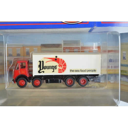 195 - Twenty five 1/76 scale OO gauge boxed diecast models of vintage commercial vehicles and cars, 23 fro... 