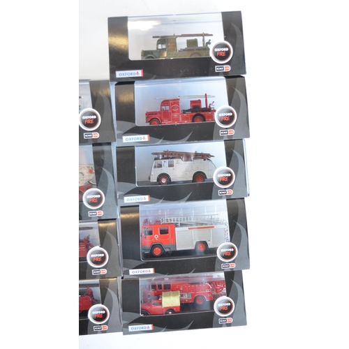 199 - Twenty boxed 1/76 scale OO gauge fire engine models, mostly Oxford Diecast (Fire and Commercials ran... 