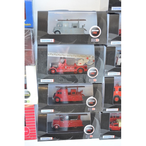 199 - Twenty boxed 1/76 scale OO gauge fire engine models, mostly Oxford Diecast (Fire and Commercials ran... 