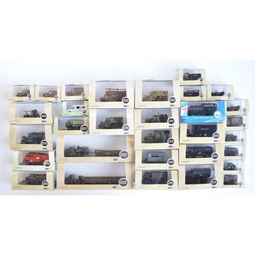 201 - Thirty one 1/76 scale OO gauge diecast military models from Oxford Diecast military range to include... 