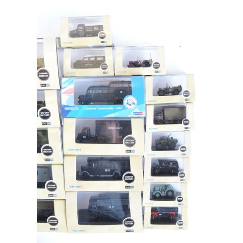 201 - Thirty one 1/76 scale OO gauge diecast military models from Oxford Diecast military range to include... 