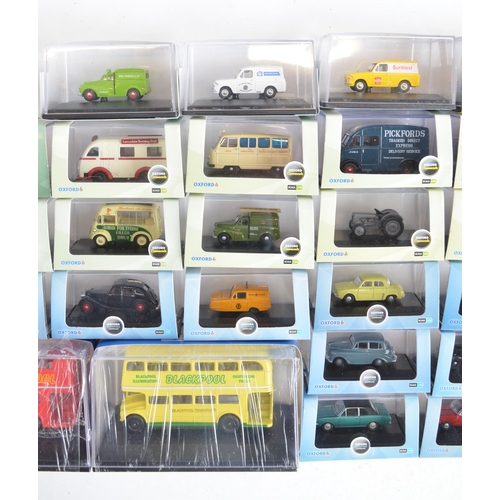 212 - Thirty six boxed 1/76 scale OO gauge diecast vehicle models from Oxford Diecast to include Commercia... 