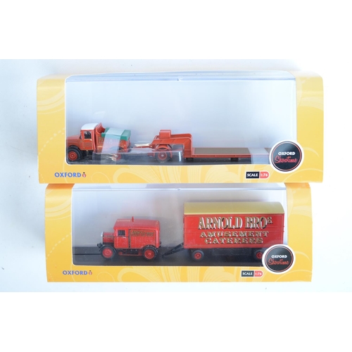 214 - Fourteen boxed 1/76 scale OO gauge diecast vehicle models from Oxford Diecast Showtime range to incl... 