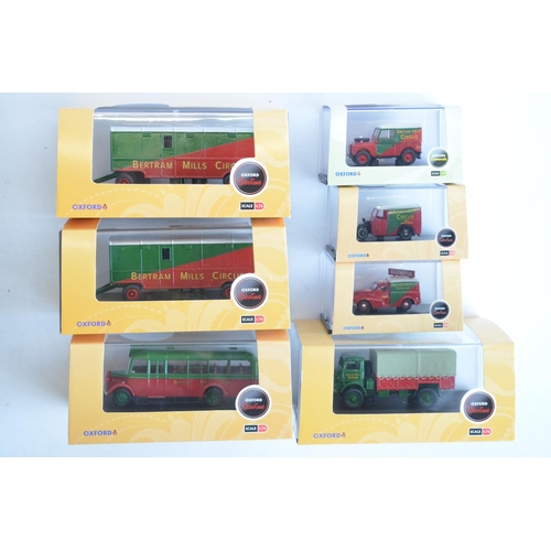 214 - Fourteen boxed 1/76 scale OO gauge diecast vehicle models from Oxford Diecast Showtime range to incl... 